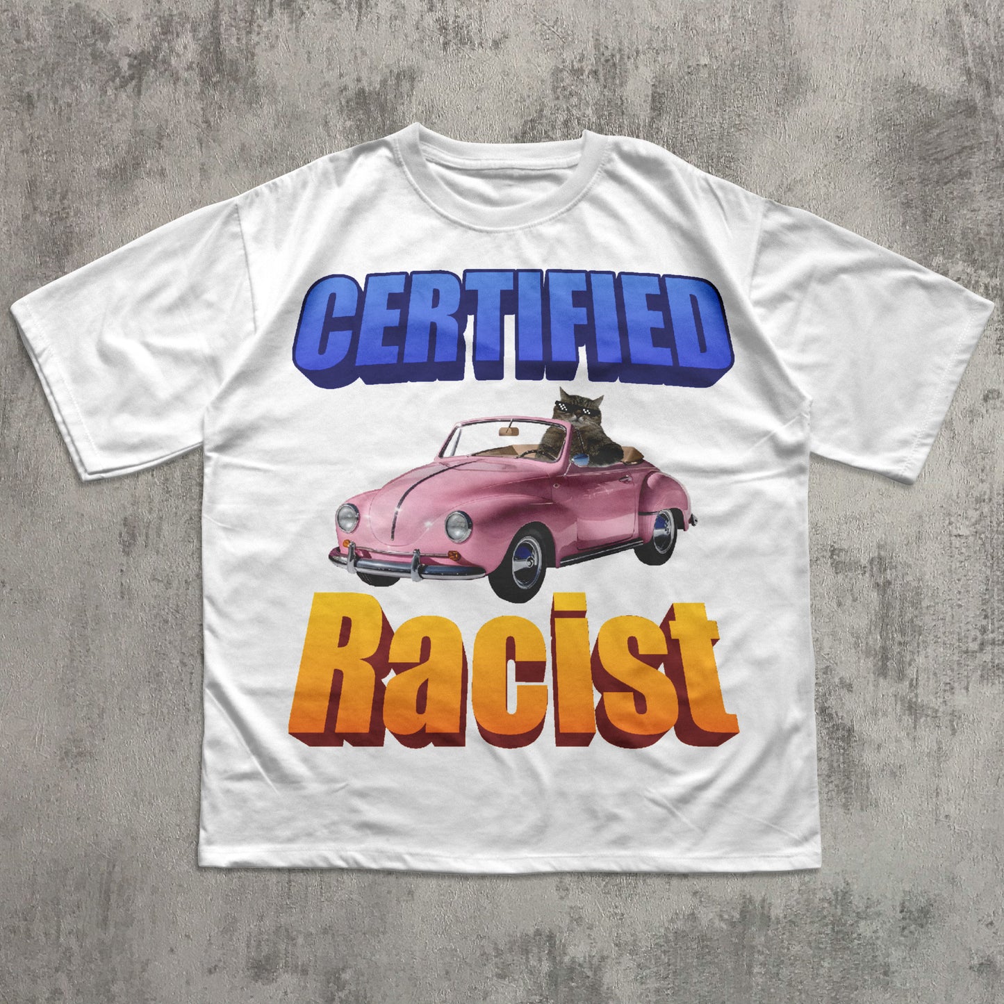 White funny cat meme t-shirt with a graphic of a pink car and text on a concrete surface
