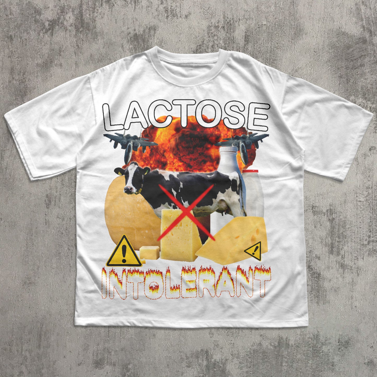 White t-shirt with graphic design featuring cows, cheese, and text on a concrete surface