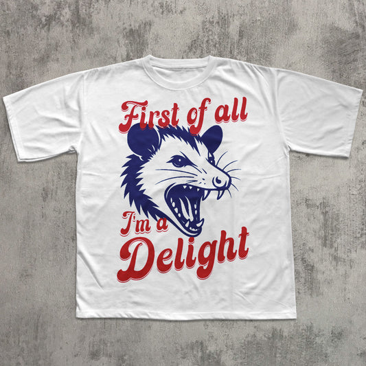 White t-shirt with a graphic of an opossum and text on a gray concrete background